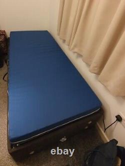 Adjustable Electric Bed With Attached Remote Control