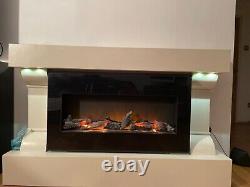 Electric fire with remote control and surround hardly used Excellent condition
